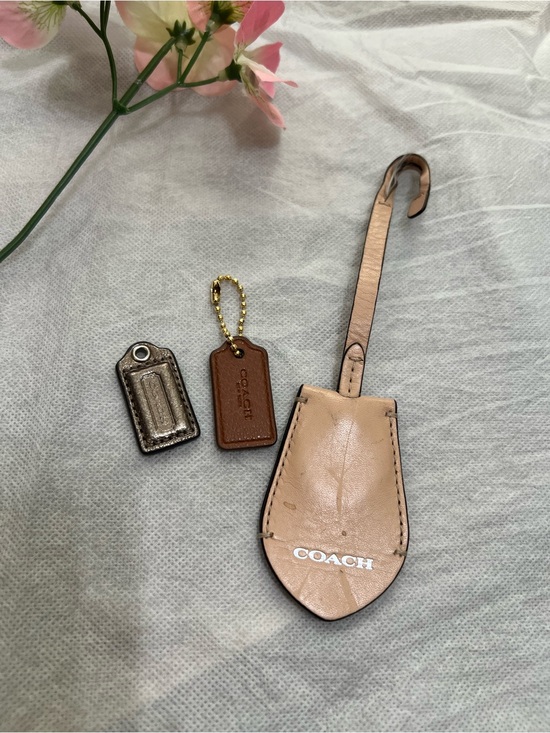 Coach Accessories - 3pc Coach lot Hangtags bag charms, in tan, Brown and Metallic pewter